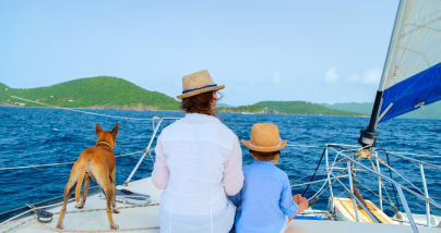 mother and son sitting together on a boat