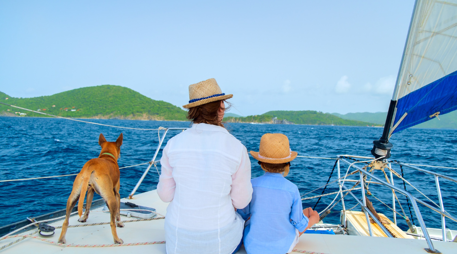 mother and son sitting together on a boat
