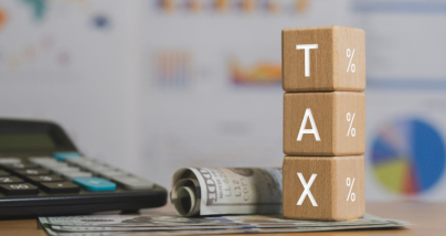 calculator and money to symbolize tax-efficient investing