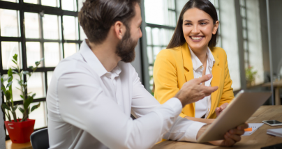 woman and financial advisor meeting to discuss mid-year financial planning