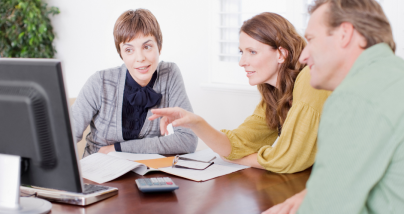 couple meeting with a financial advisor for retirement