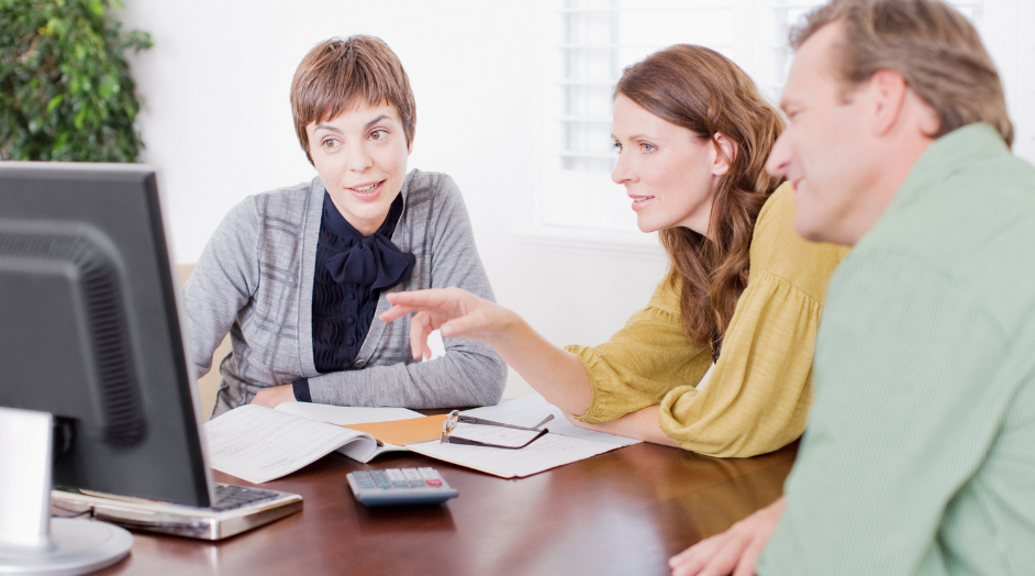 couple meeting with a financial advisor for retirement